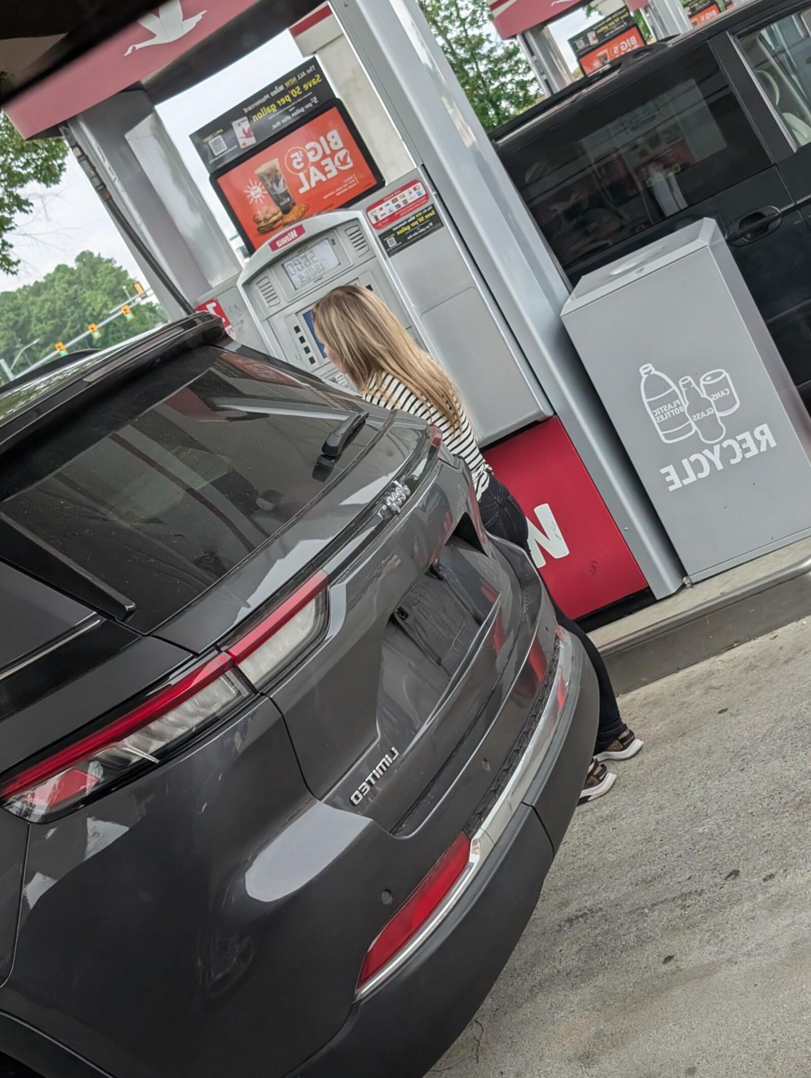 Cute blonde at gas station 