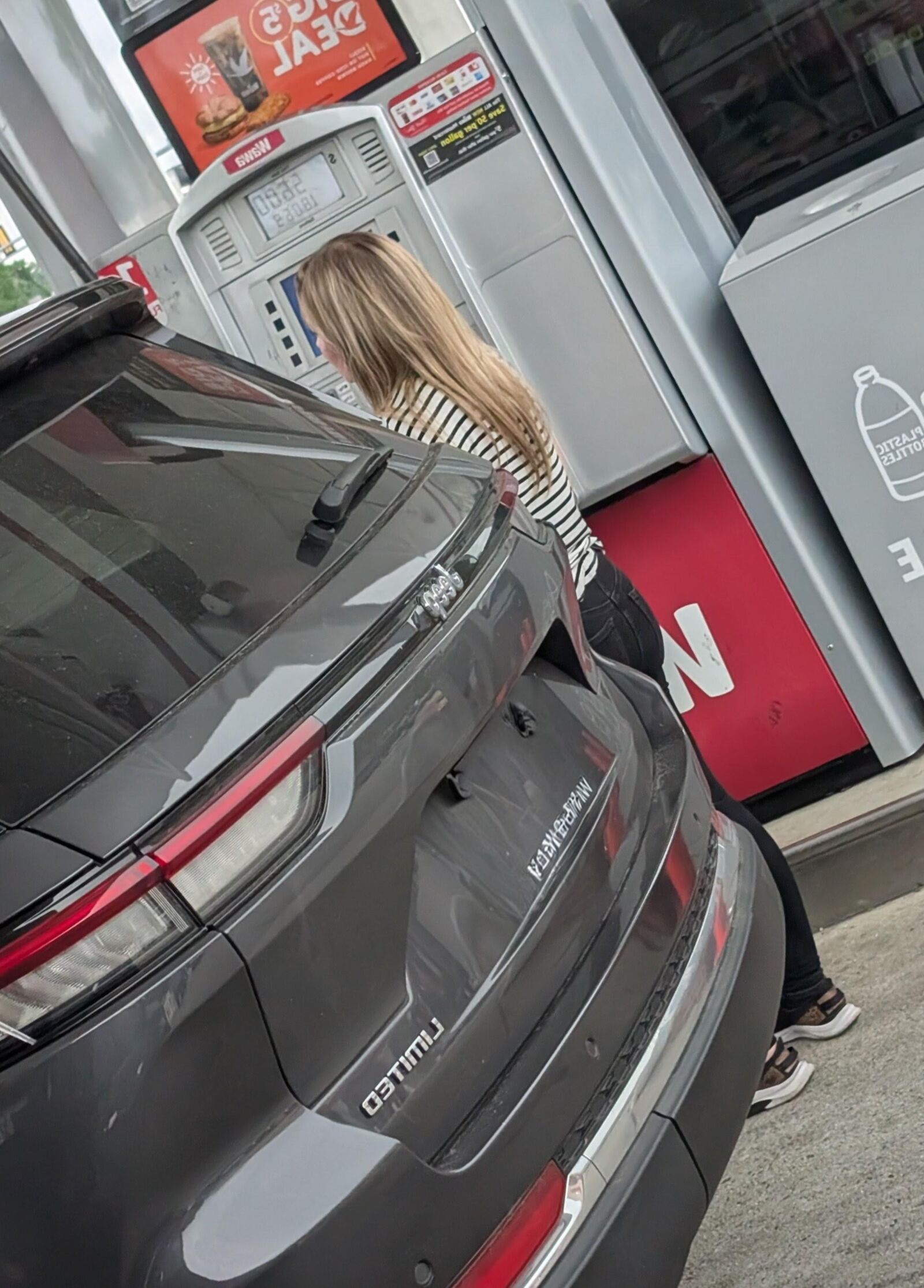 Cute blonde at gas station 
