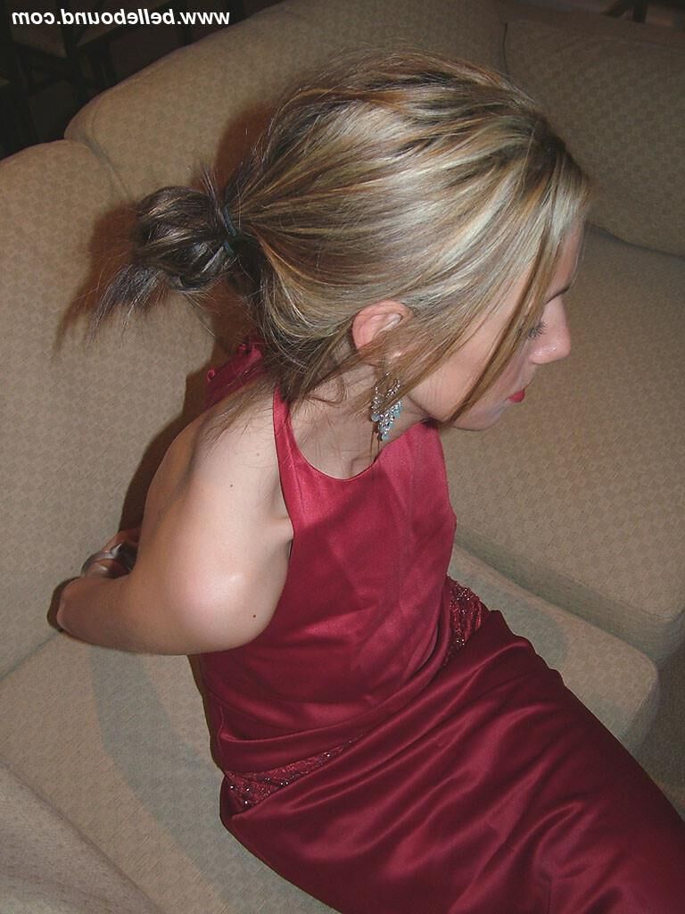 Chrissy Bound in Maroon Dress