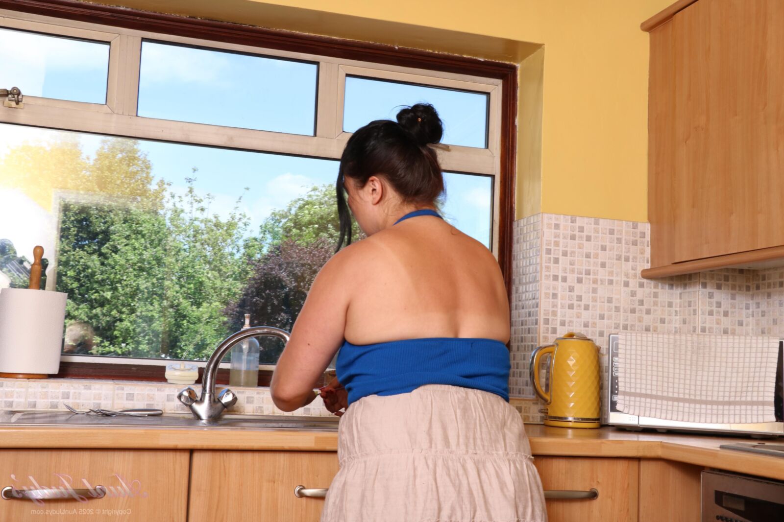 Christina Santes yo Plays for You in the Kitchen