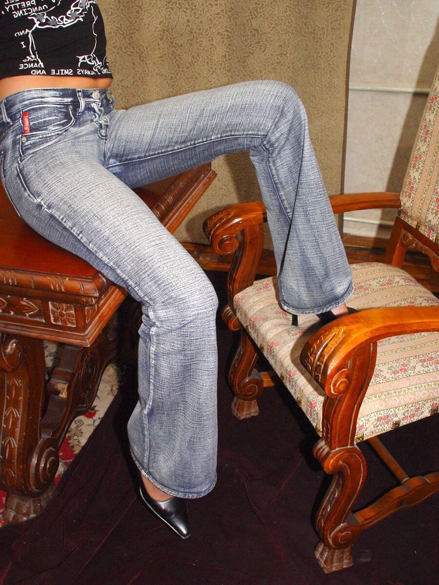 Blond in Jeans Pans Playing with Dildo