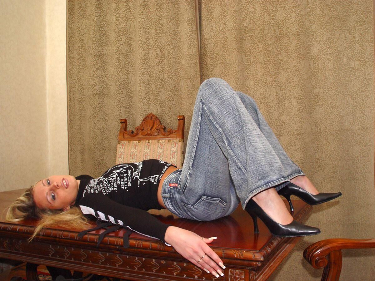 Blond in Jeans Pans Playing with Dildo