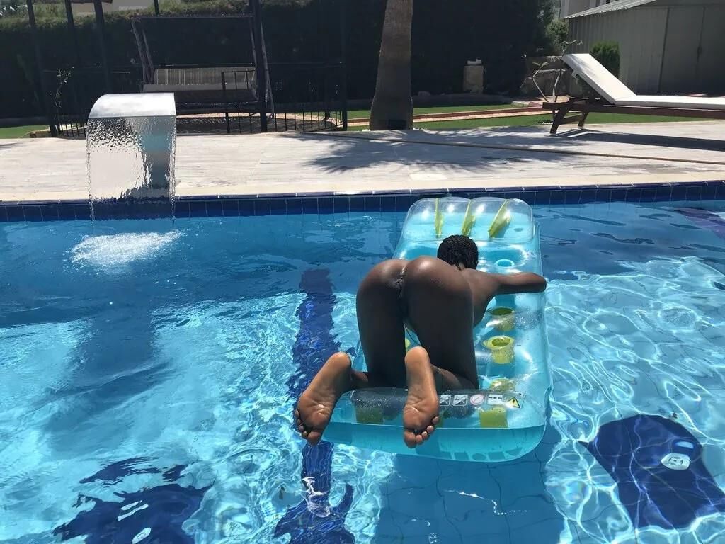 Slim Ebony Naked in Public Pool