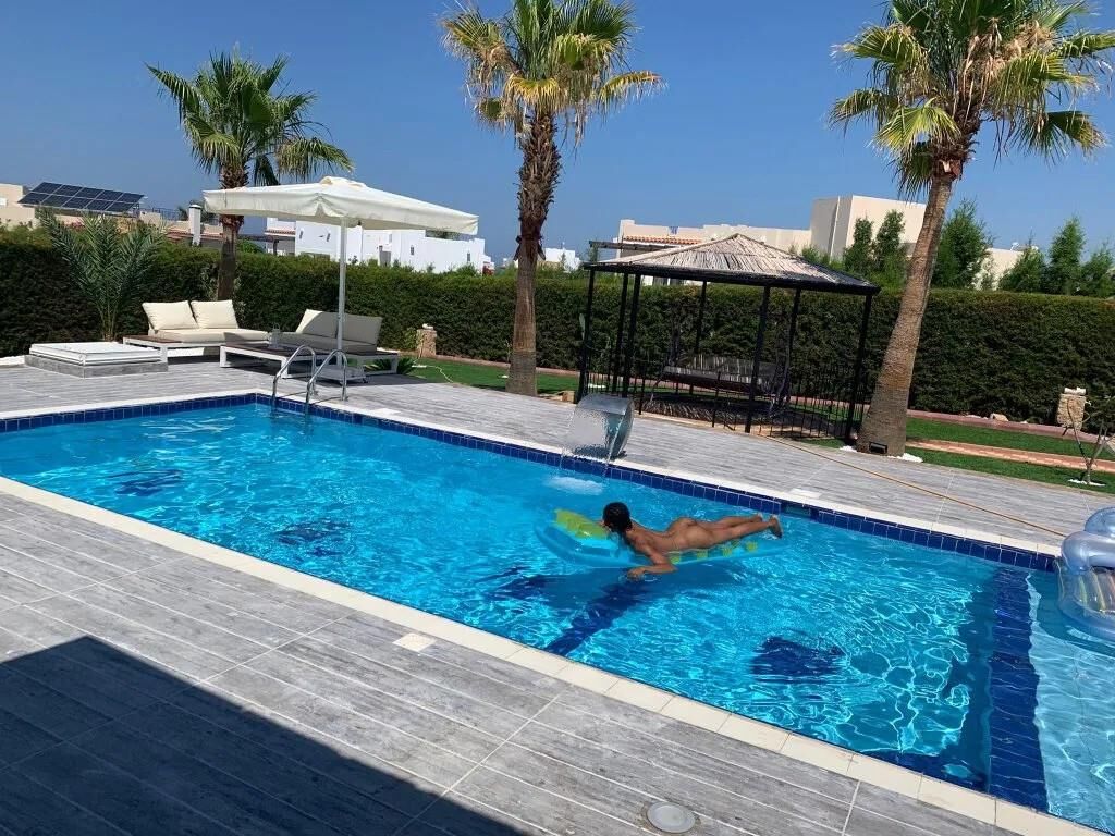Slim Ebony Naked in Public Pool