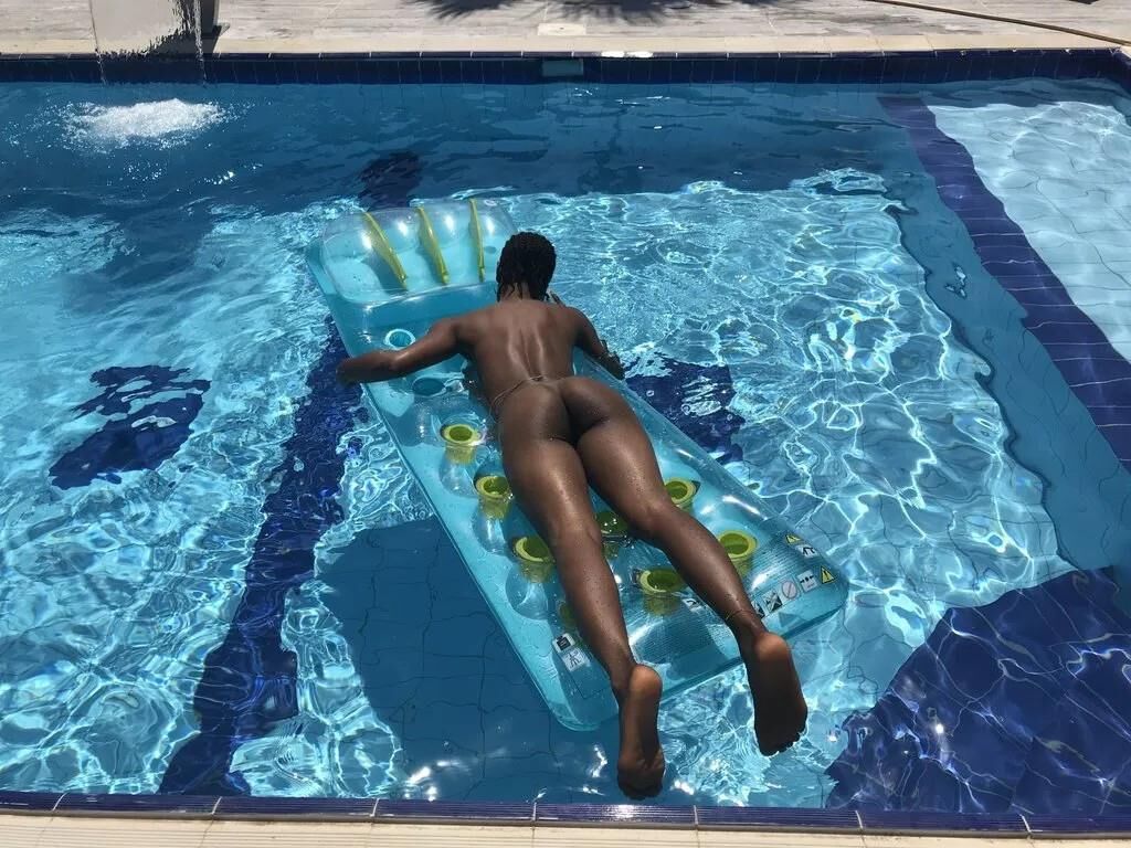 Slim Ebony Naked in Public Pool