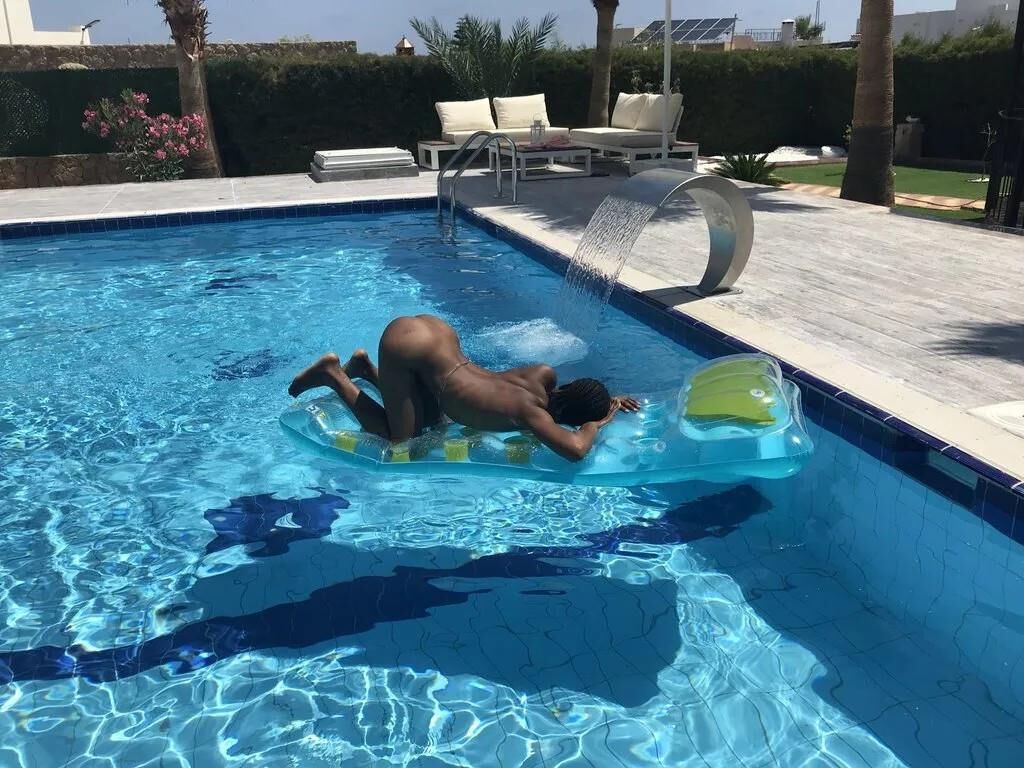 Slim Ebony Naked in Public Pool