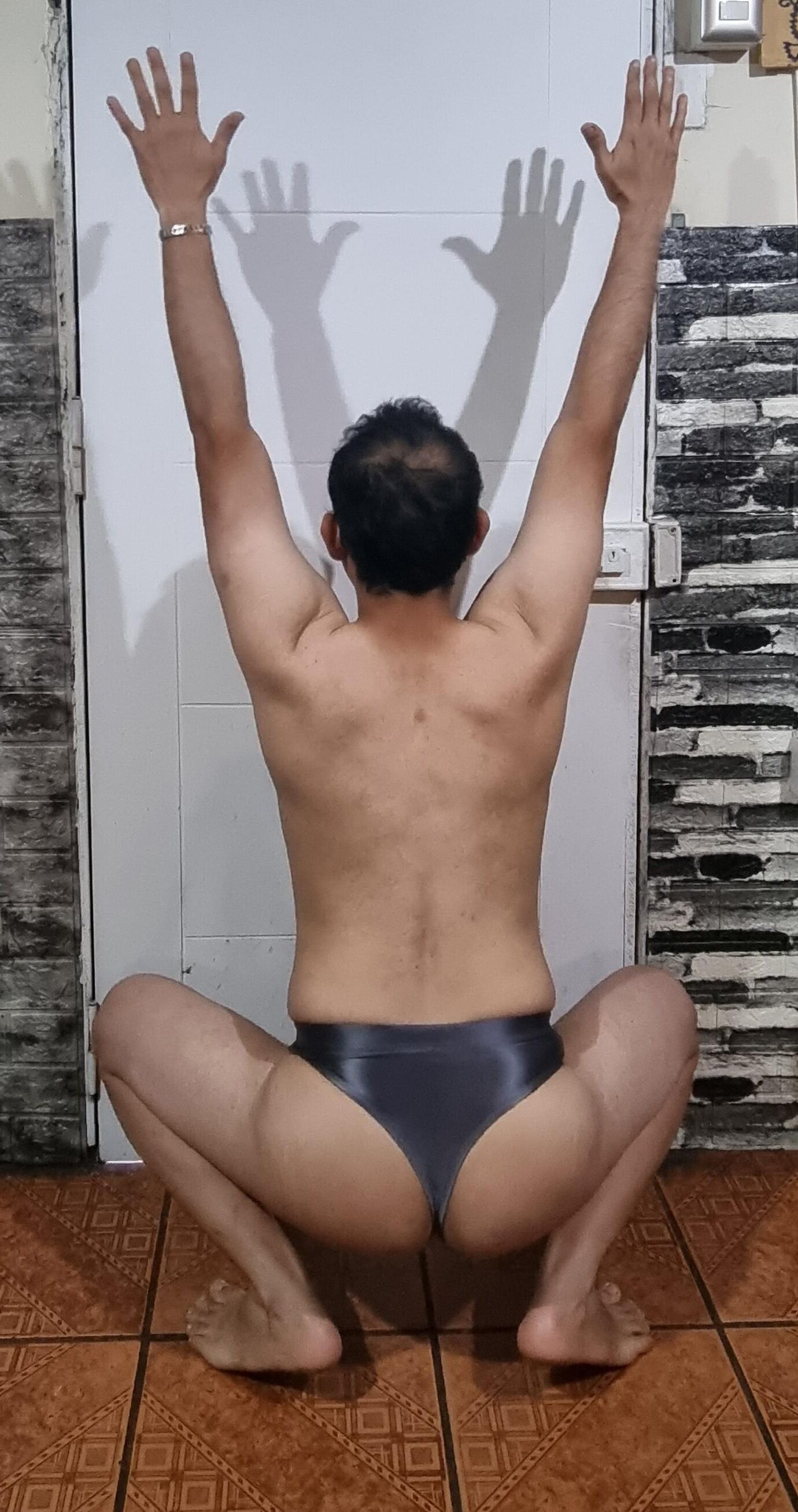 Tanga gris brillante
