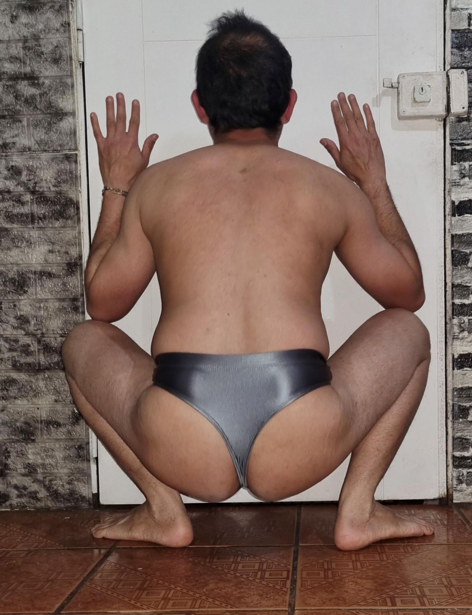 Tanga gris brillante